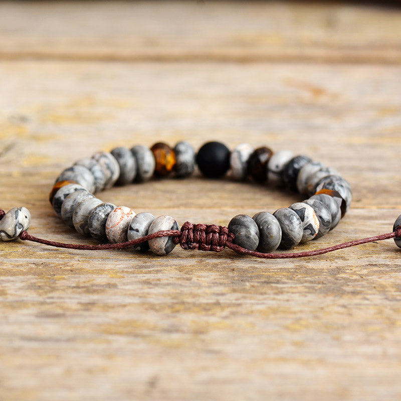 Handgefertigtes Armband aus grauem Jaspis, schwarzem Onyx und Tigerauge